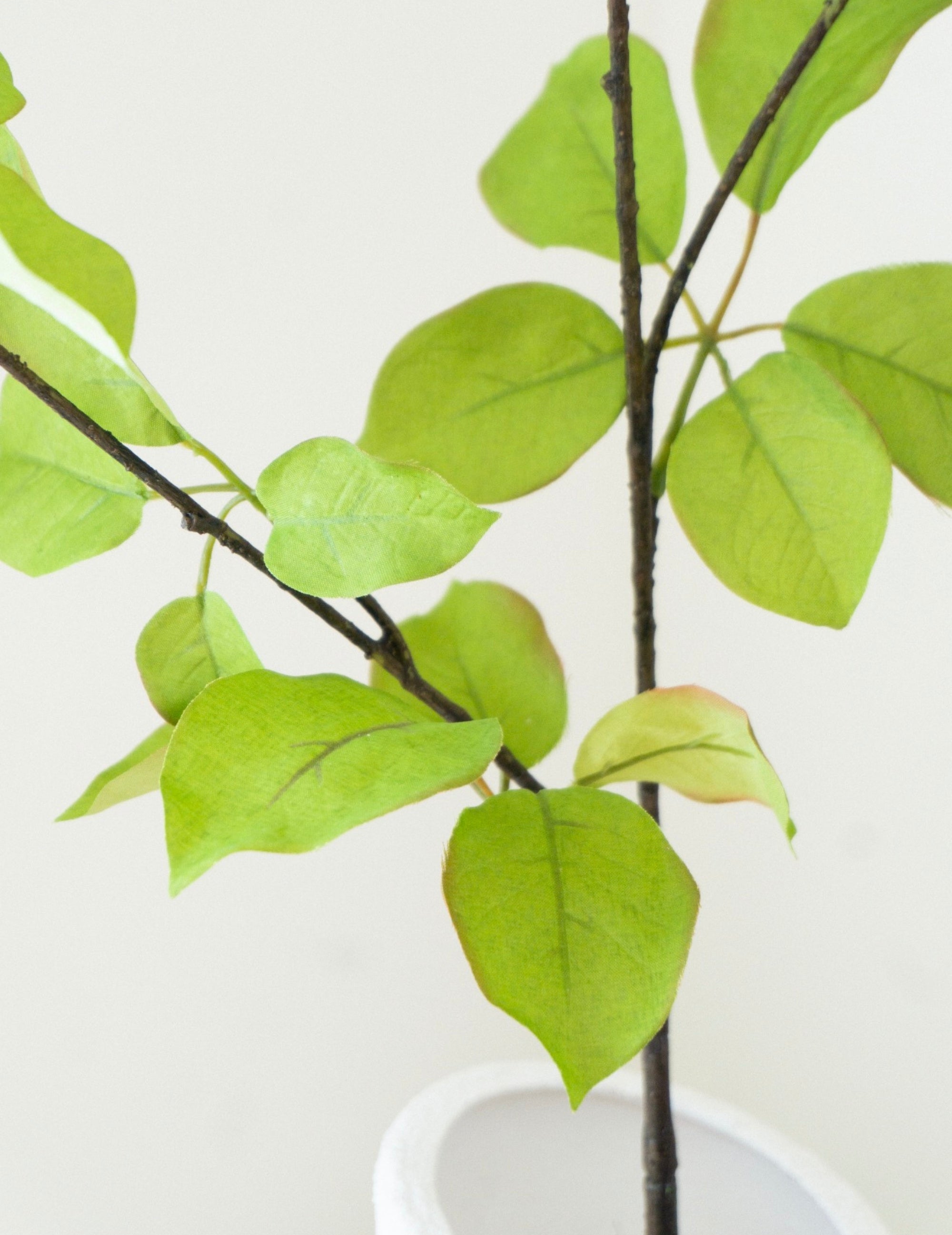 Kunstblume Blätterzweig Grün