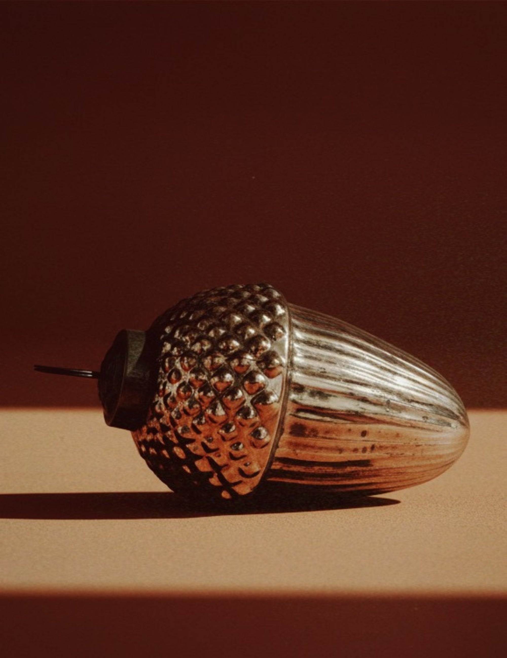 Christmas ornament made of glass acorn brown gold