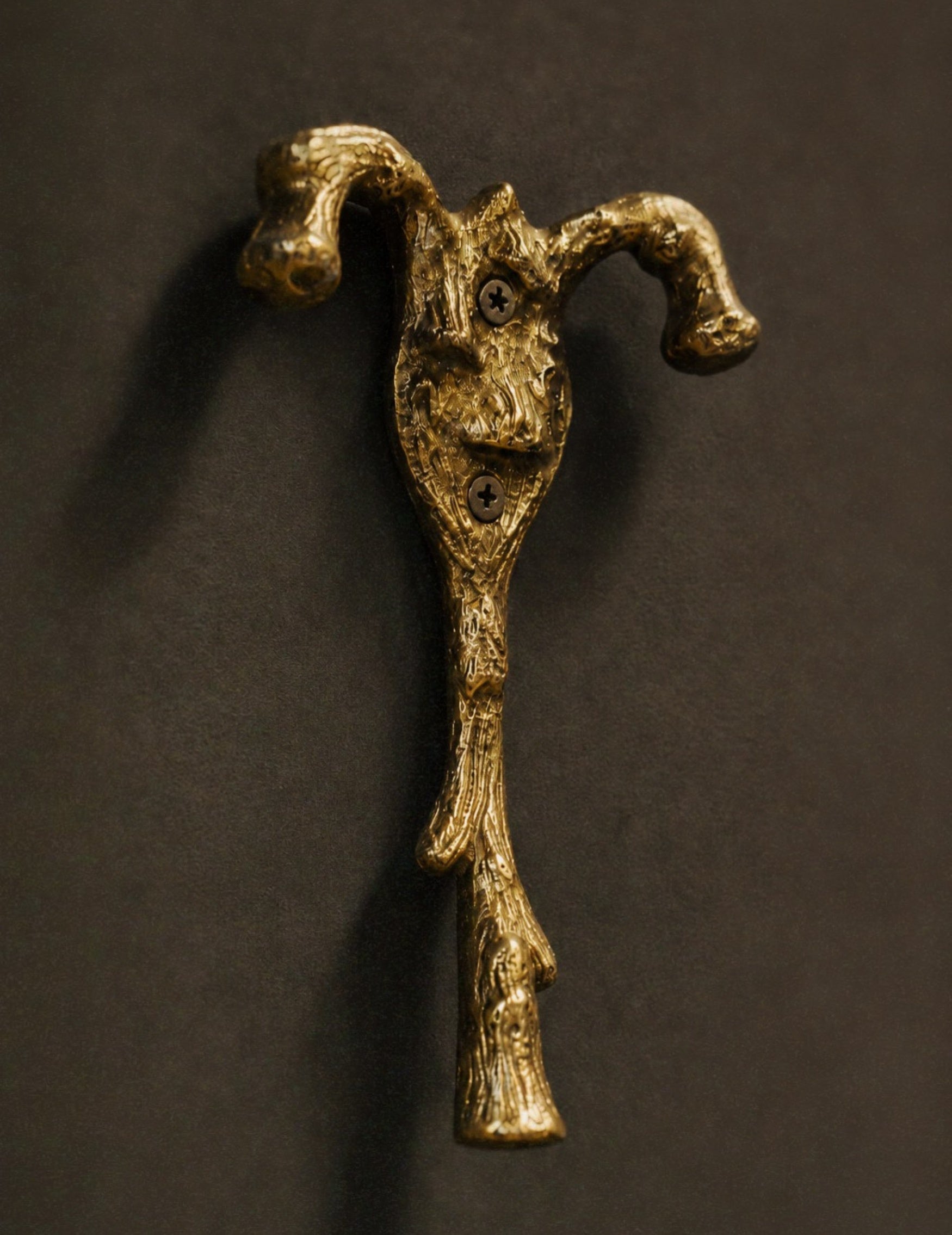 Goldener Wandhaken Ast