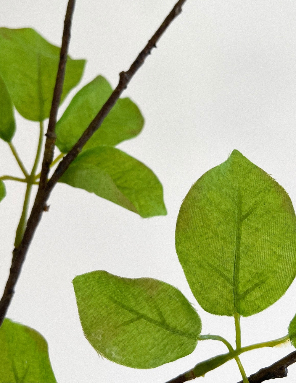 Kunstblume Blätterzweig Grün